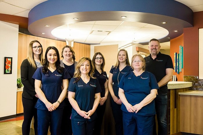 Professional photo of a team working for a dental office